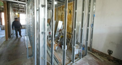 Interior construction with metal studs and unfinished walls