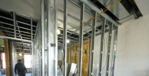 Interior construction with metal studs and unfinished walls
